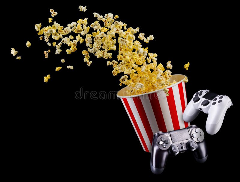 Flying Popcorn and Video Game Joystick Gamepad Isolated on a Black