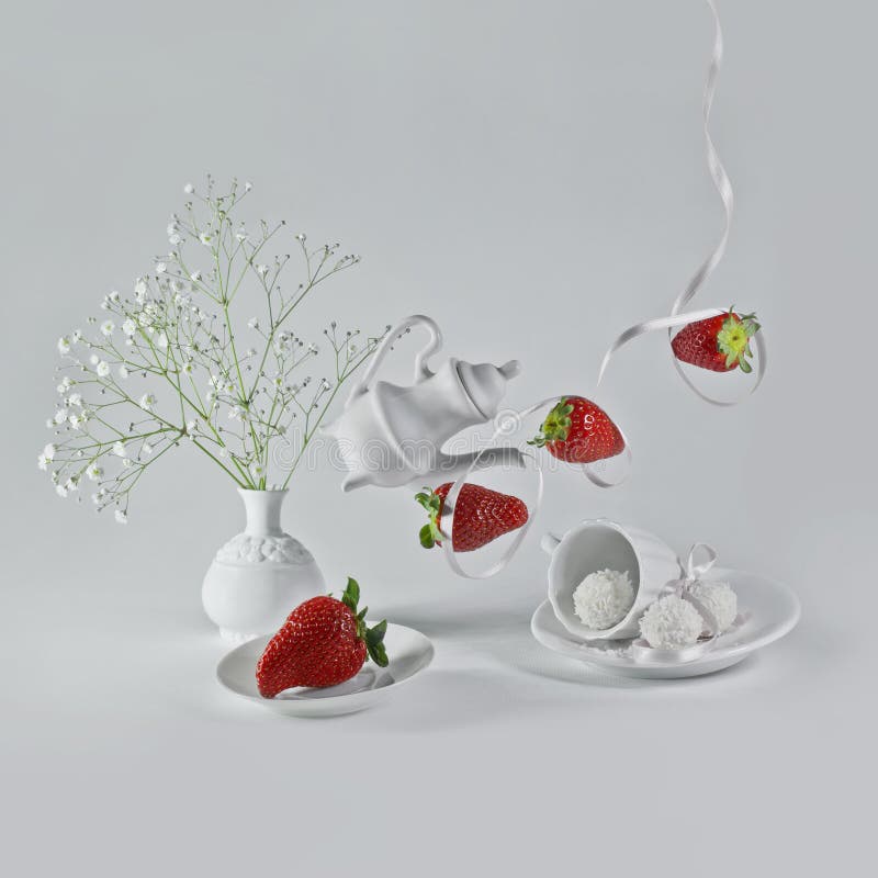 Flying strawberries with white ribbon.