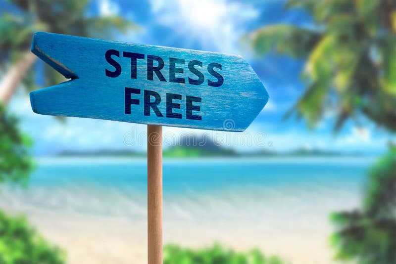 Stress free board arrow on beach with sunshine background. Stress free board arrow on beach with sunshine background
