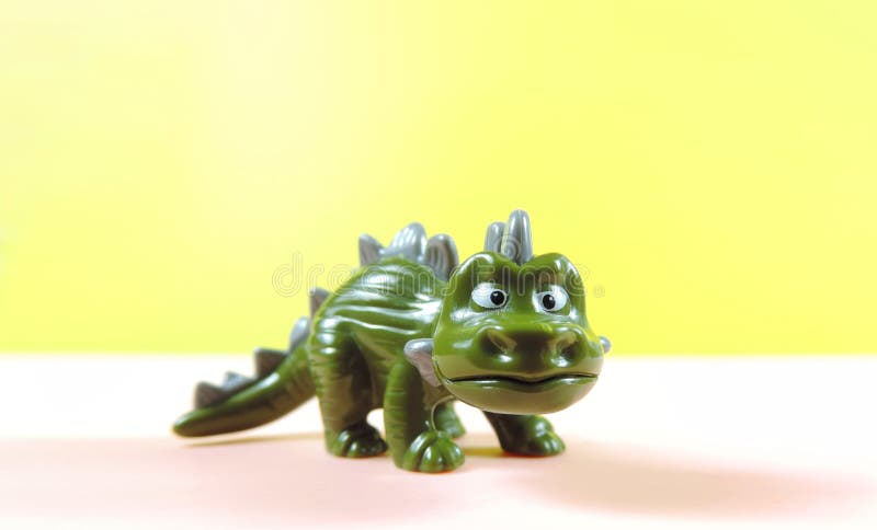 Desenho animado de dinossauro verde bonito no fundo - Stockphoto #27977684