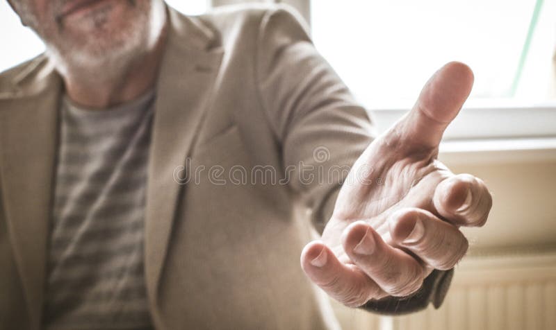 Foco da mão amiga Homem de negócios superior fotos de stock Foco da mão amiga Homem de negócios superior fotos de stock
