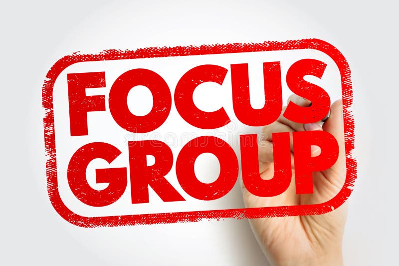FOCUS GROUP written in bold red stencil letters within a rugged stamp-style border while a hand writes on the side, ideal for royalty free stock photography