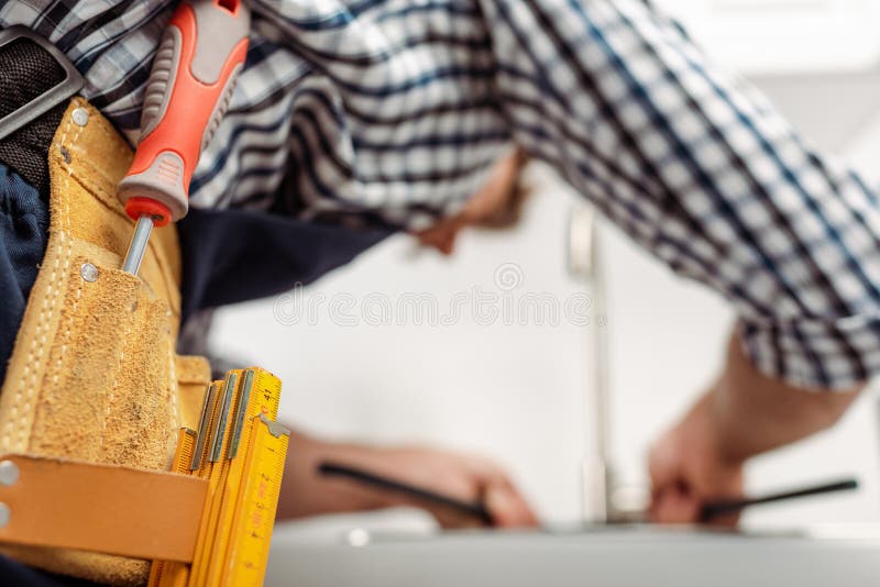 Focus of Plumber in Tool Belt Stock Image Image of workwear