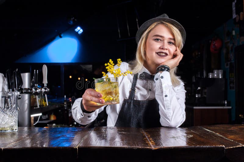 Professional Girl Barman Intensely Finishes His Creation in the Bar ...