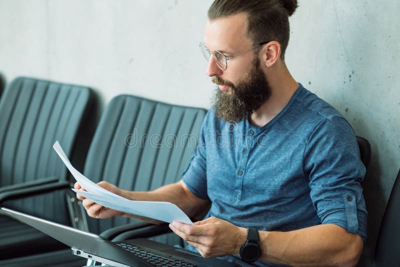 Focused man read document information report data royalty free stock photo Focused man read document information report data royalty free stock photo