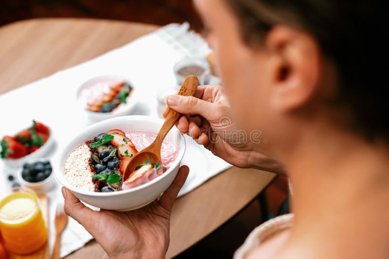 Focused photo on healthy food yogurt toppings with berry fruit. Pecuniary. stock images