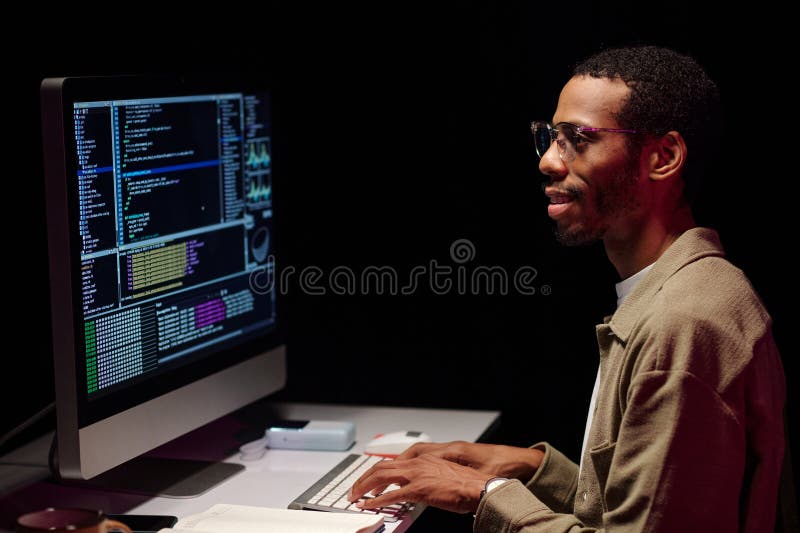Focused Programmer Analyzing Code on Computer Screen Stock Photo ...