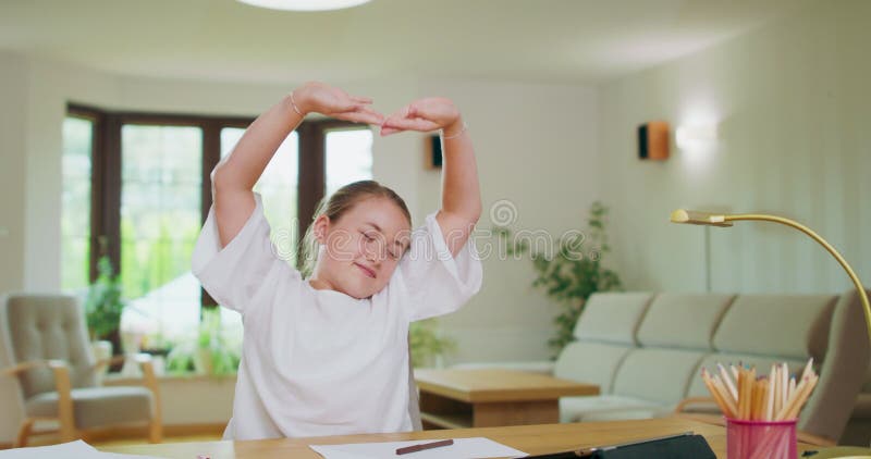 Focused Teen Girl, at the Desk, Scrolls Tablet, Then Stretches and Yawns  with Closed Eyes Felt-tip Pens, White Paper Stock Video - Video of alone,  child: 243304515