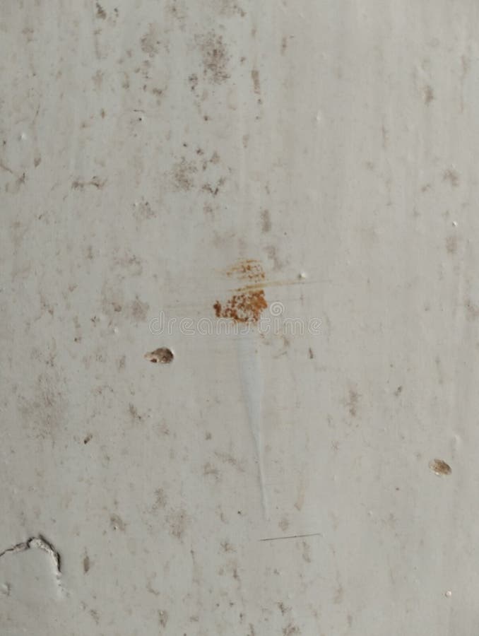 Brown spot in the wall stock photo. Image of small, brown 266451156