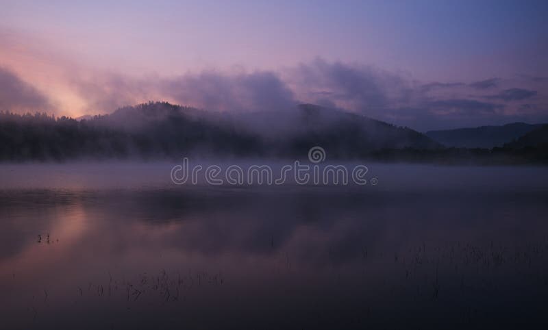 Fog at dawn over Lake Solina in the Bieszczady