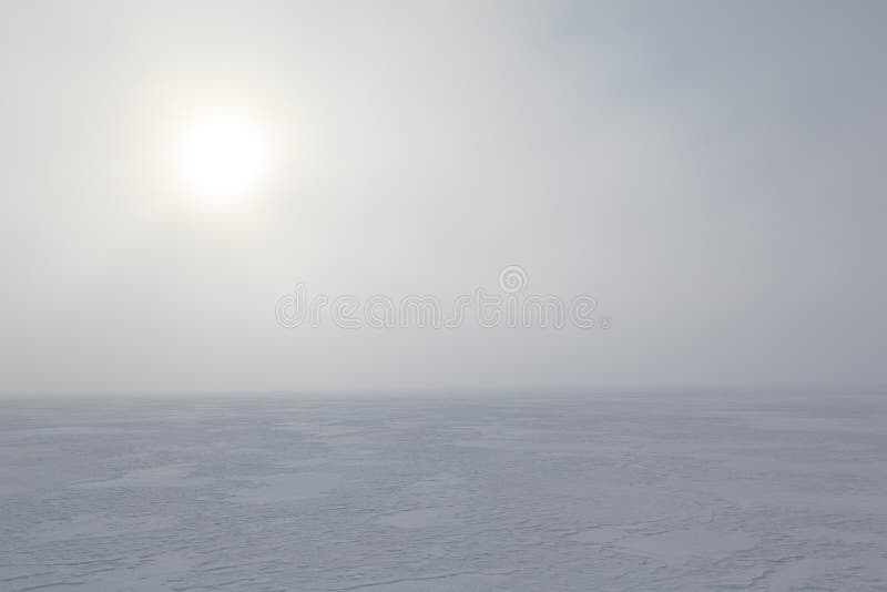 Fog on frozen by sea. background