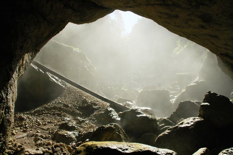 Foggy cave entrance, Romania stock images Foggy cave entrance, Romania stock images