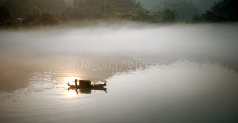 Foggy river in sunrise