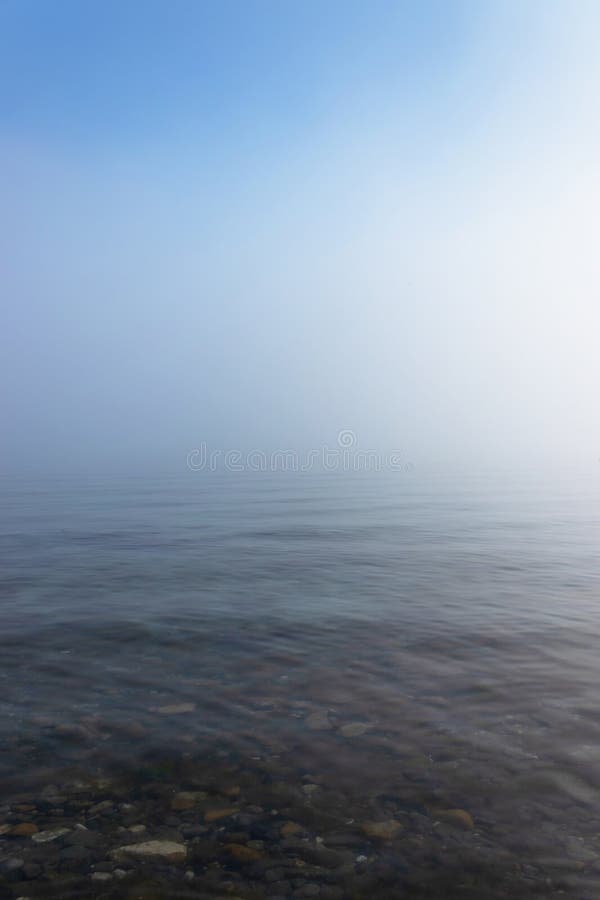 Foggy seascape, mystical look and atmosphere royalty free stock photography