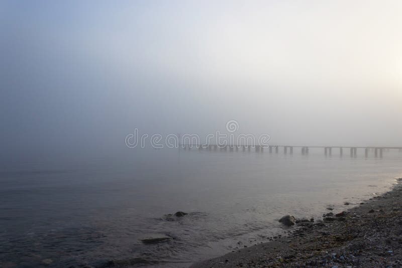 Foggy seascape, mystical look and atmosphere stock images
