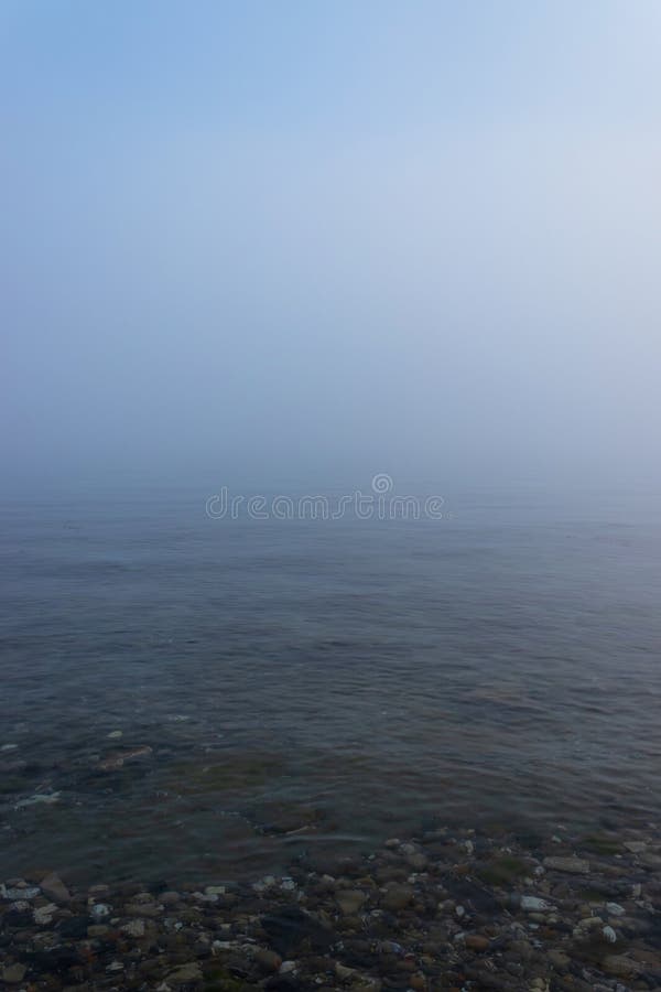 Foggy seascape, mystical look and atmosphere royalty free stock photography