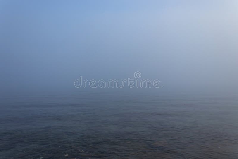 Foggy seascape, mystical look and atmosphere stock images