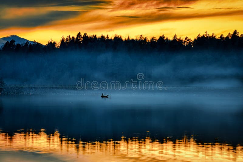 Foggy sunset royalty free stock images