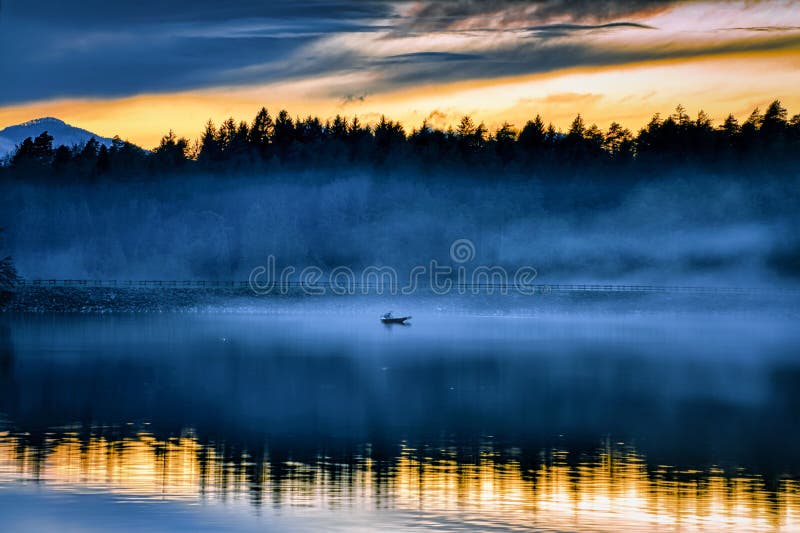 Foggy sunset royalty free stock photography