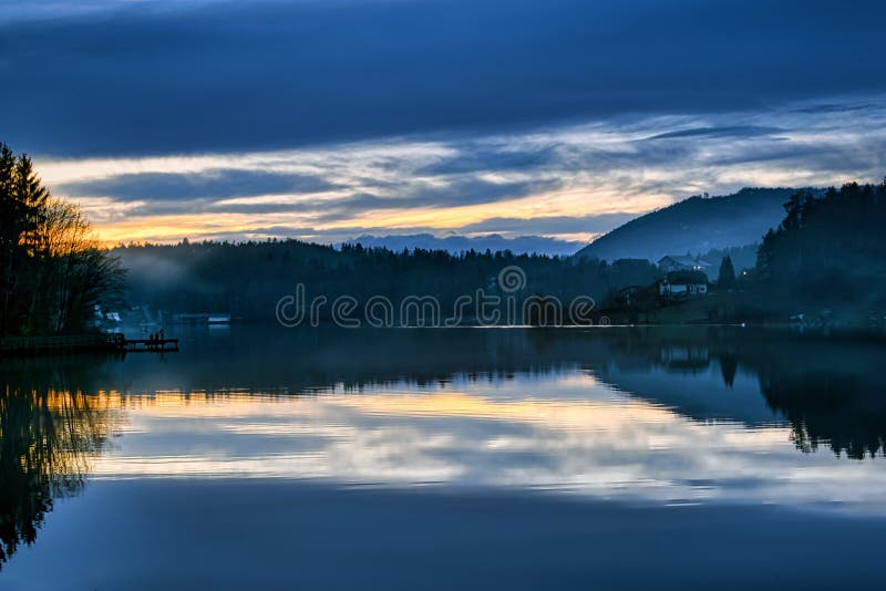 Foggy sunset stock images