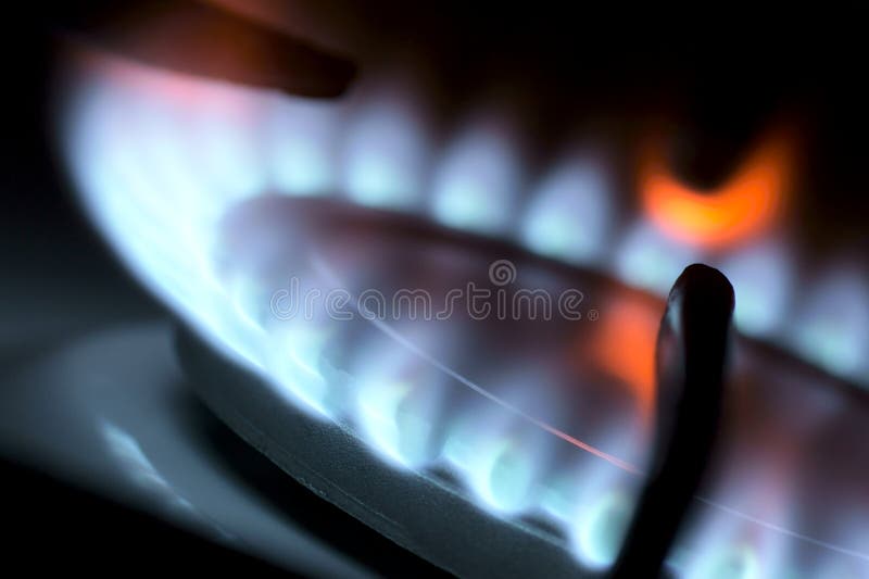 Flame from a gas stove abstractly (close-up). Flame from a gas stove abstractly (close-up).