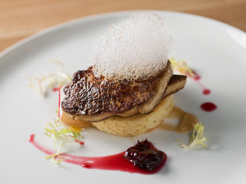 Plating a foie gras dish stock image. Image of meat, dish 26698075