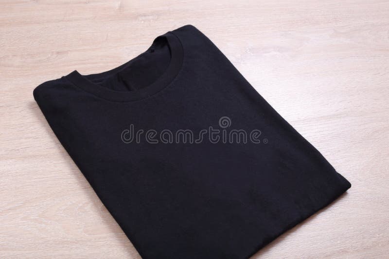 Folded Black Polo T-shirt Mockup Isolated on White Background with ...