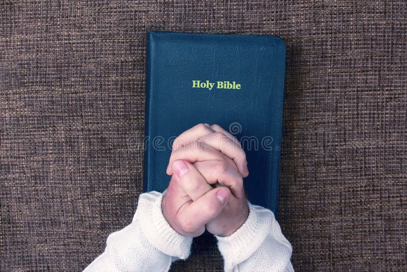 Folded Hands Of The Man In The Holy Bible Stock Photo Image Of Faith