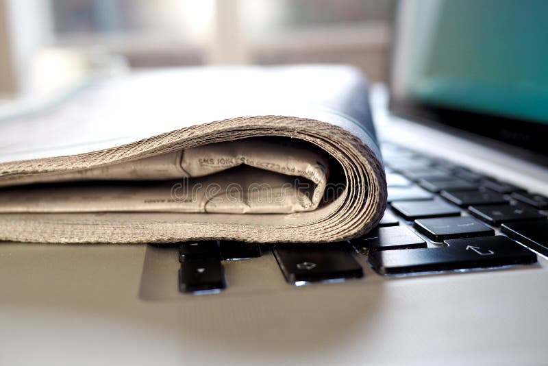 Newspaper and Laptop Still Live Stock Photo Image of electronics