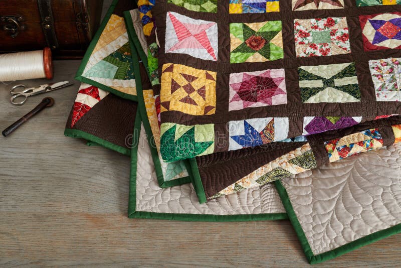 Folded Quilt, Wooden Chest and Sewing Accessories Stock Image Image