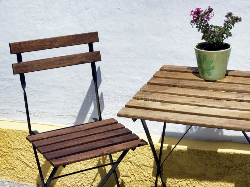 Folding chair and table stock photo