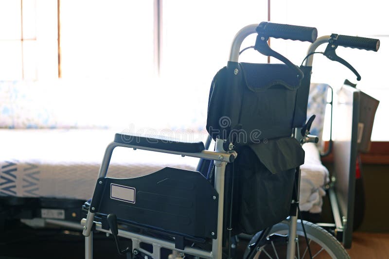 Folding Small Wheelchair and Electric Bed for Nursing Care Stock Image Image of turning