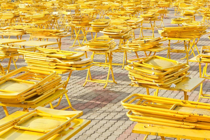 Folding tables and chairs stock image. Image of retro 229140331