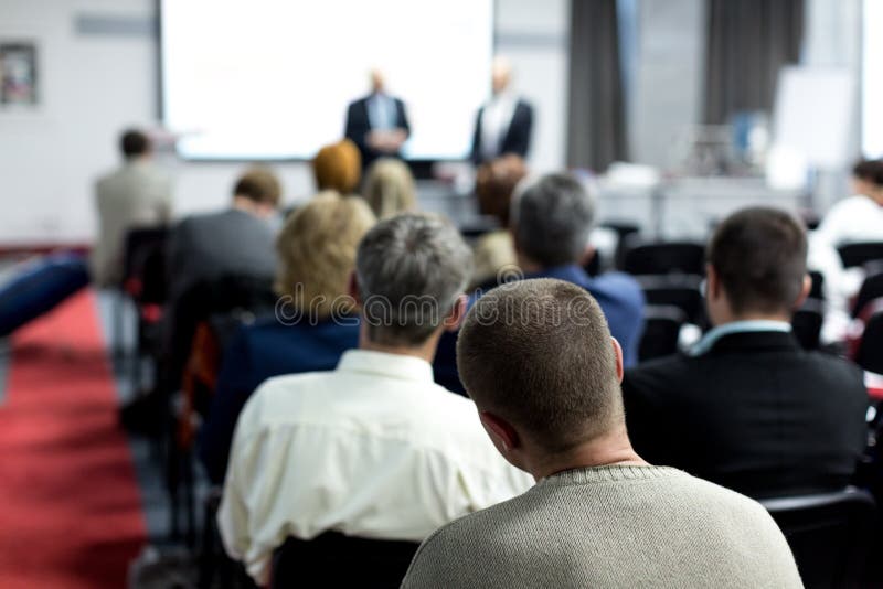 Folk på konferensen tillbaka sikt horisontal arkivbild Folk på konferensen tillbaka sikt horisontal arkivbild