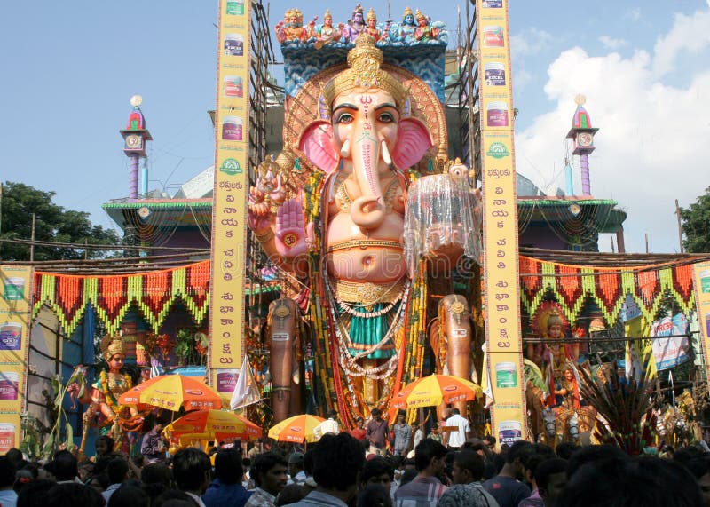 People pray to 58 feet high Lord Ganesh idol, at Khairatabad, during Hindu festival on September 28,2012 in Hyderabad,India.Thi s is one of the biggest idol made annualy. People pray to 58 feet high Lord Ganesh idol, at Khairatabad, during Hindu festival on September 28,2012 in Hyderabad,India.Thi s is one of the biggest idol made annualy.