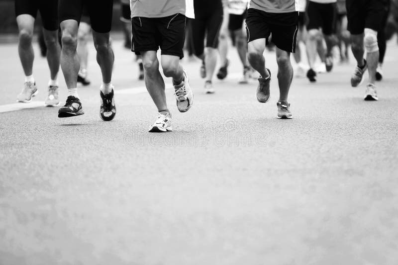 Fonctionnement d'athlètes de marathon photo libre de droits Fonctionnement d'athlètes de marathon photo libre de droits