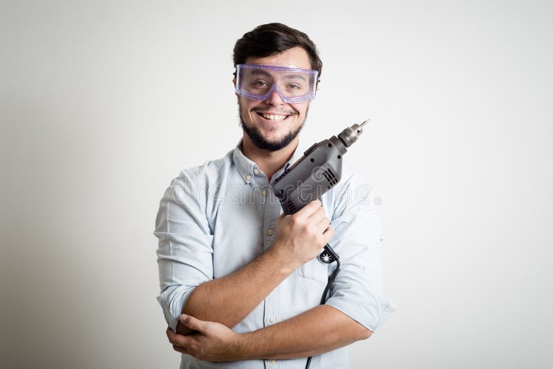 Mesure Fonctionnante De Bricolage De Jeune Homme Avec Le Mètre Image stock  - Image du appartement, domestique: 35491477