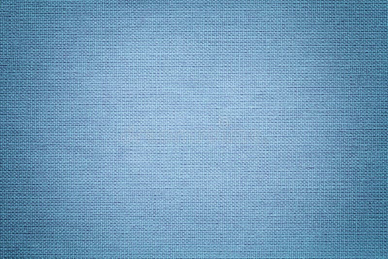 Fond albastru deschis din material textil. țesătură cu textură naturală. fundal royalty free stock image