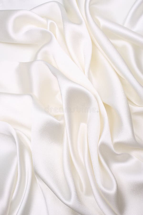 White satin cloth background with nice foldings. White satin cloth background with nice foldings