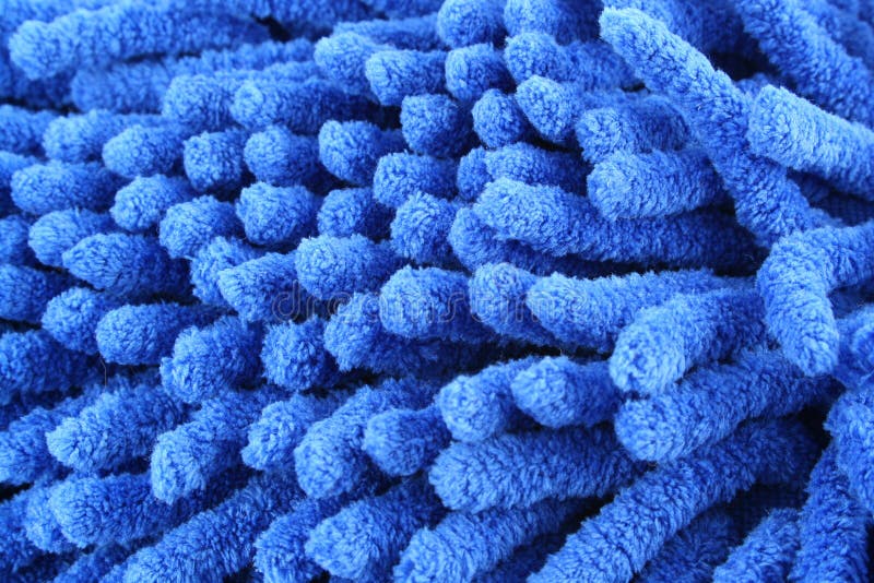 Fond bleu d'instruction-macro de chiffon de microfiber image libre de droits Fond bleu d'instruction-macro de chiffon de microfiber image libre de droits