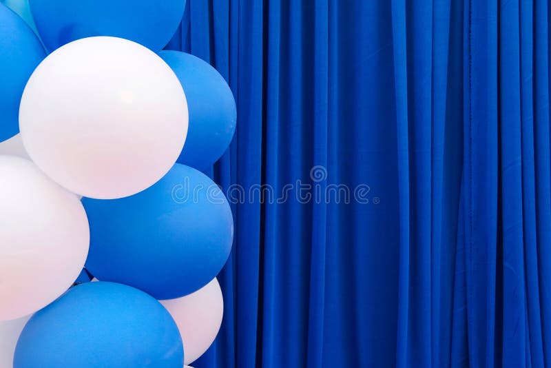 Blue and white balloons  Blue curtain background. Blue and white balloons  Blue curtain background