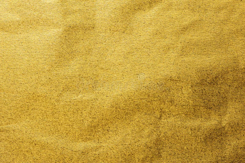 Fond brillant métallique de texture de papier d'emballage de feuille de feuille d'or photographie stock Fond brillant métallique de texture de papier d'emballage de feuille de feuille d'or photographie stock