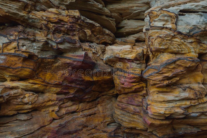 Fond coloré naturel de roche, texture de plan rapproché photos libres de droits Fond coloré naturel de roche, texture de plan rapproché photos libres de droits