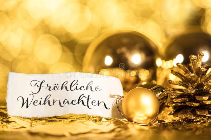 Fond d'or de Noël, label avec le texte allemand photos libres de droits Fond d'or de Noël, label avec le texte allemand photos libres de droits