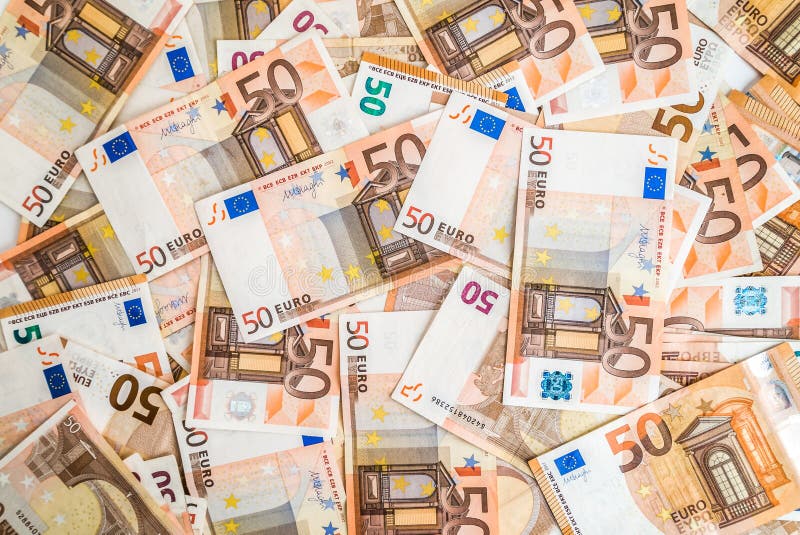 Euro currency banknotes background. European money cash with 50 euros bills, top view, flat lay. Euro currency banknotes background. European money cash with 50 euros bills, top view, flat lay.
