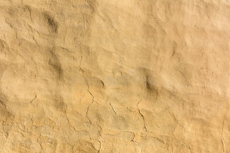 Fond jaune, mur plâtré beige images stock Fond jaune, mur plâtré beige images stock