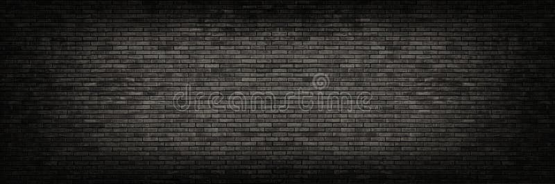 Fond panoramique de mur de briques noir