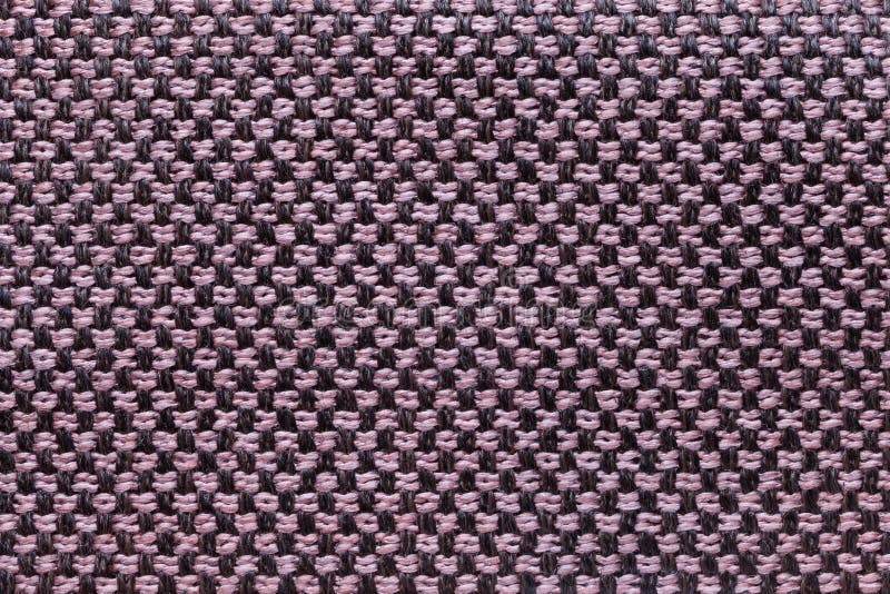 Fond rose et noir de textile avec le modèle d'échecs, plan rapproché Structure du macro de tissu image libre de droits Fond rose et noir de textile avec le modèle d'échecs, plan rapproché Structure du macro de tissu image libre de droits