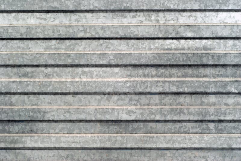 Fond, texture : surface de feuillard galvanisé profilé image libre de droits Fond, texture : surface de feuillard galvanisé profilé image libre de droits
