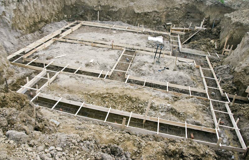 View on a house foundations pit. View on a house foundations pit.